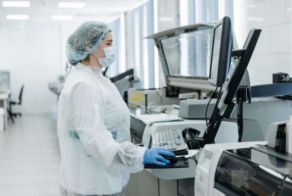 Woman using a Computer inside a Laboratory